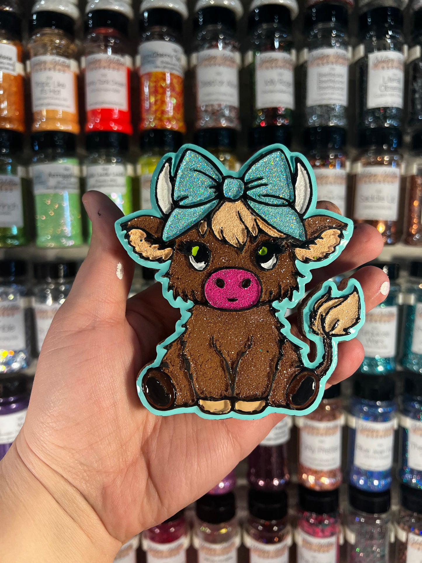 Highland cow with bow